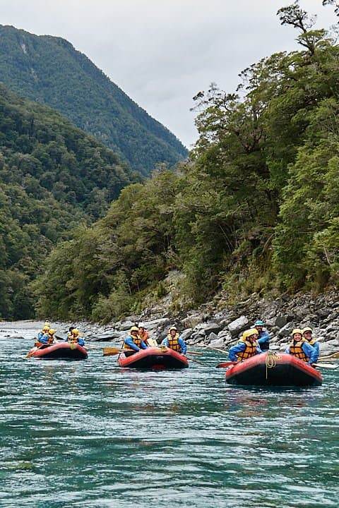 three rafts on the Landsborough River, Hidden Valleys expedition, Westland, New Zealand